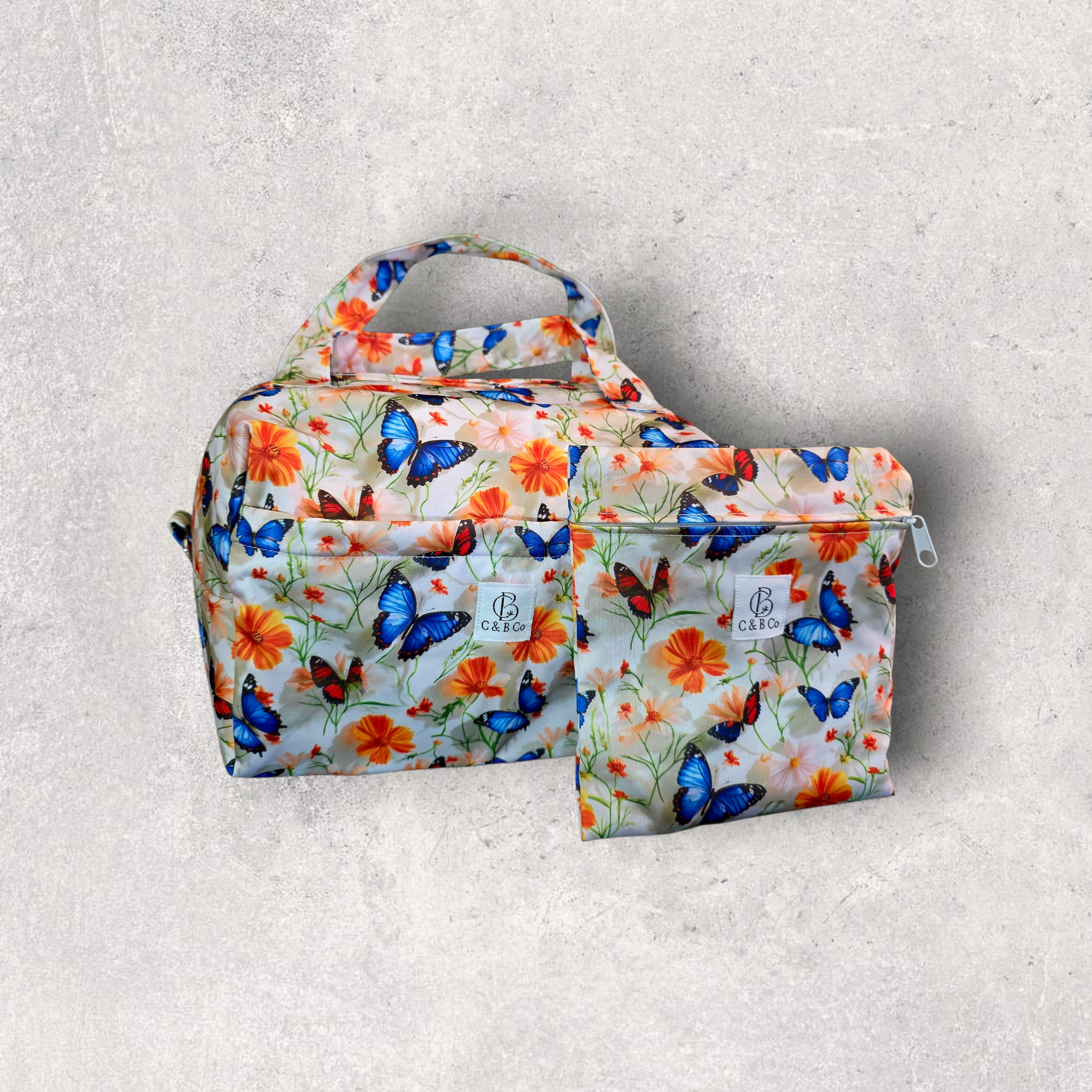 Fly Free Diaper Duffle — Waterproof Baby Bag with Matching Mini Wet Bag
