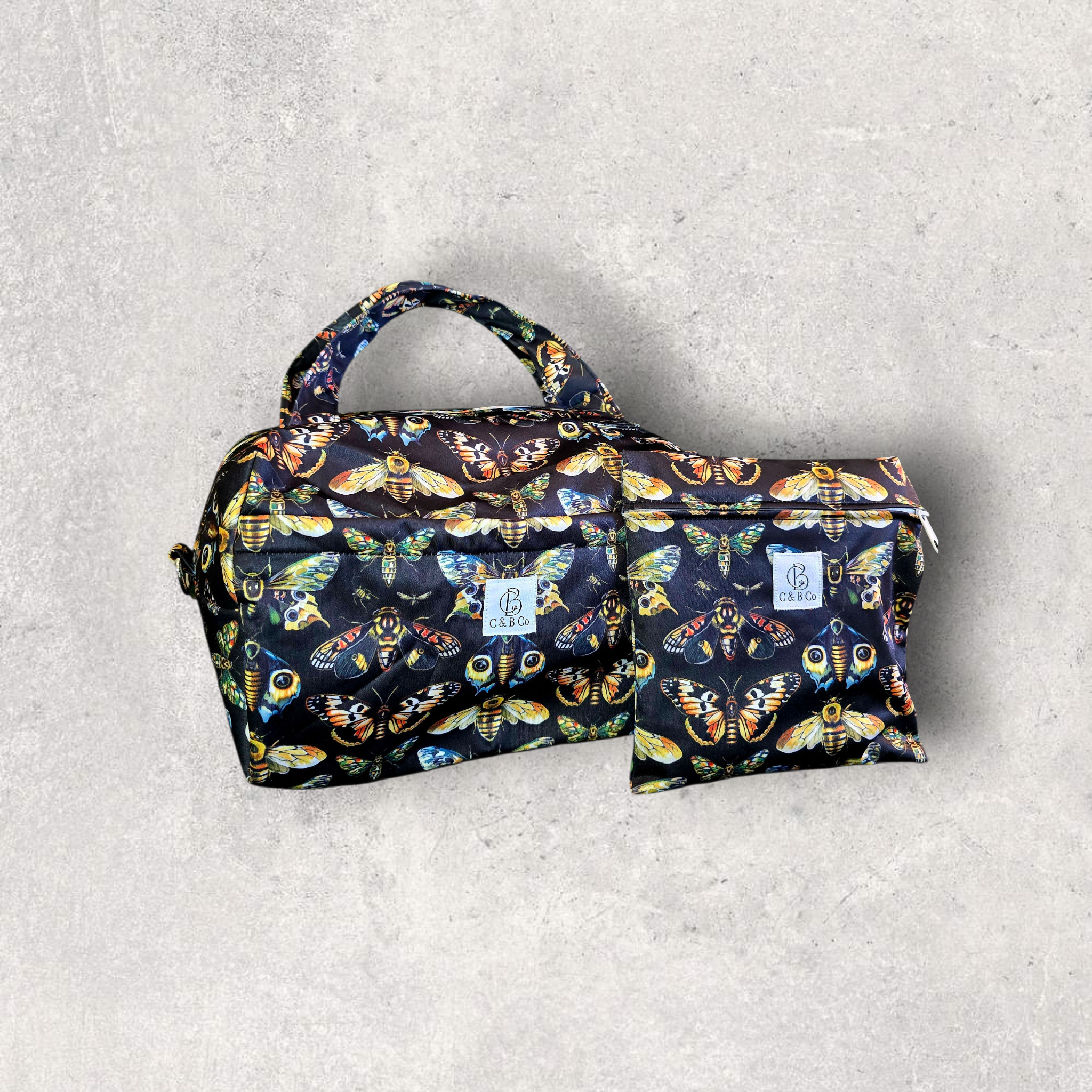 Gilded Wings Diaper Duffle — Waterproof Baby Bag with Matching Mini Wet Bag