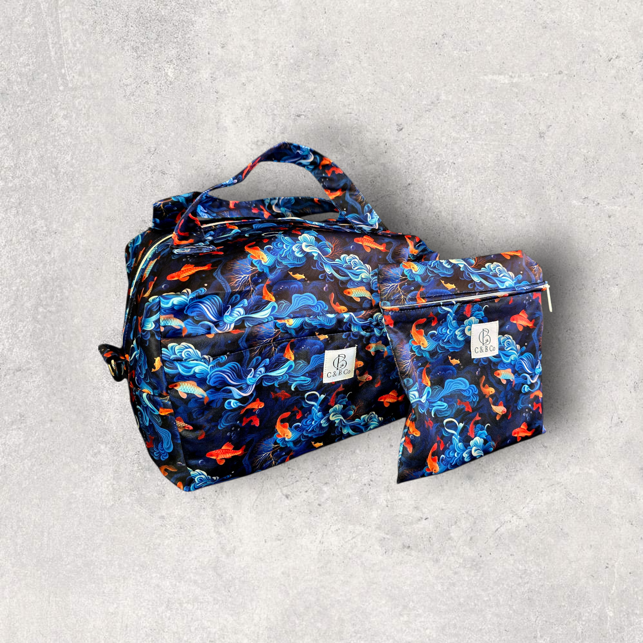 Sacred Koi Diaper Duffle — Waterproof Baby Bag with Matching Mini Wet Bag